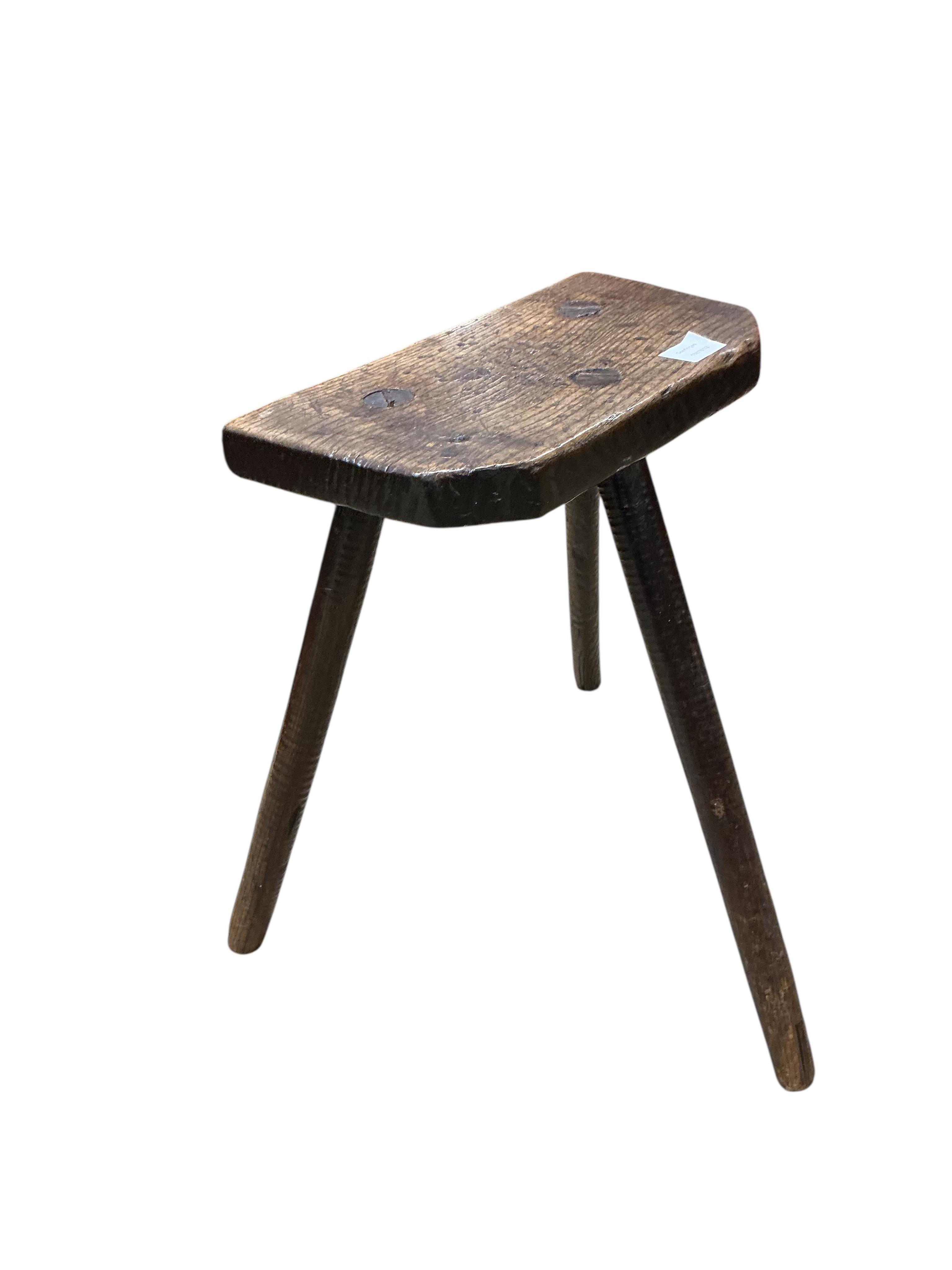 A late 18th /early 19th century oak Sheffield cutler's stool, width 39cm, depth 23cm, height 59cm